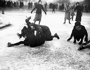 10321454
&copy; NMeM Daily Herald Archive
Ice skaters falling over, Wimbledon, London, 27 January 1932.