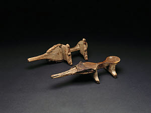 10285161
&copy; Science Museum
Pair of Nuba wooden pattens (shoes), Sudan, c 1890-1920.
