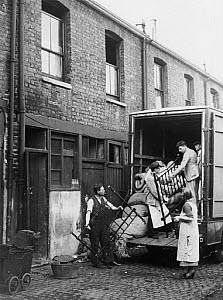 10249965
&copy; NMeM Daily Herald Archive
Home removals, c 1930s. Loading the bed int
