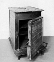 10182274
Gas cooker cased in wood, c.mid 19th century.