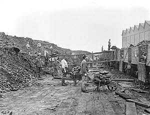 10444176
&copy; National Railway Museum
Workers loading coal at Newton Heath, Greater Manchester, c 1918.
