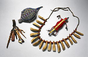 10308990
&copy; Science Museum
Amulets, necklace and bottom part of a needle case, USA or Canada and Inuit.