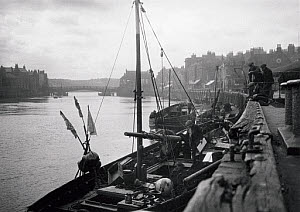 10309722
&copy; NMeM - Kodak Collection
Small fishing vessels moored to the quayside at Whitby, North Yorkshire, c 1930s.