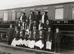 10451603
&copy; National Railway Museum
Railway workers beside a carriage, South Yorkshire, c 1916.