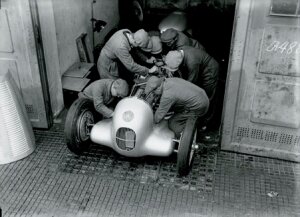 10314921
&copy; NMPFT - Zoltan Glass
Mechanics working on a Mercedes-Benz racing car, Berlin, 1934.
