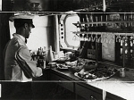 10250724
&copy; NMeM Daily Herald Archive
Preparing lunch on the Imperial Airways aeroplane 'Scylla', 19 November 1936.