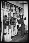 10431931
Man checking an automatic telephone exchange, 1933.