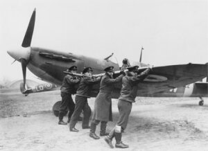 10313643
&copy; NMeM Daily Herald Archive
Airmen wheeling out a Spitfire, 26 February 1942.