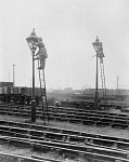 10321665
&copy; National Railway Museum
Women railway workers obscuring gas lamps, Greater Manchester, May 1917.