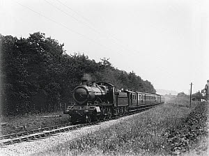 10548777
&copy; National Railway Museum
Long train including stores van, 4 coach set of 4 wheelers, clerestory and bogie coaches, c.1928